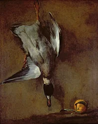 A Mallard Duck Hanging on a Wall with a Seville Orange